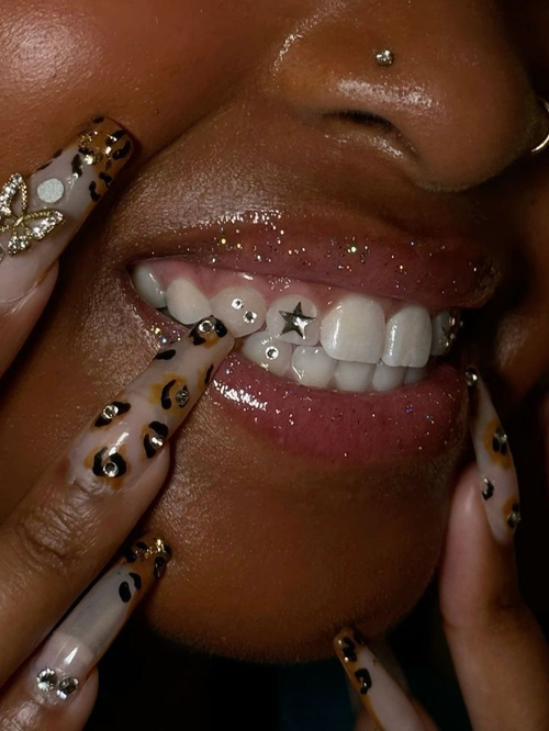 Tooth gems with star charm and leopard print nails